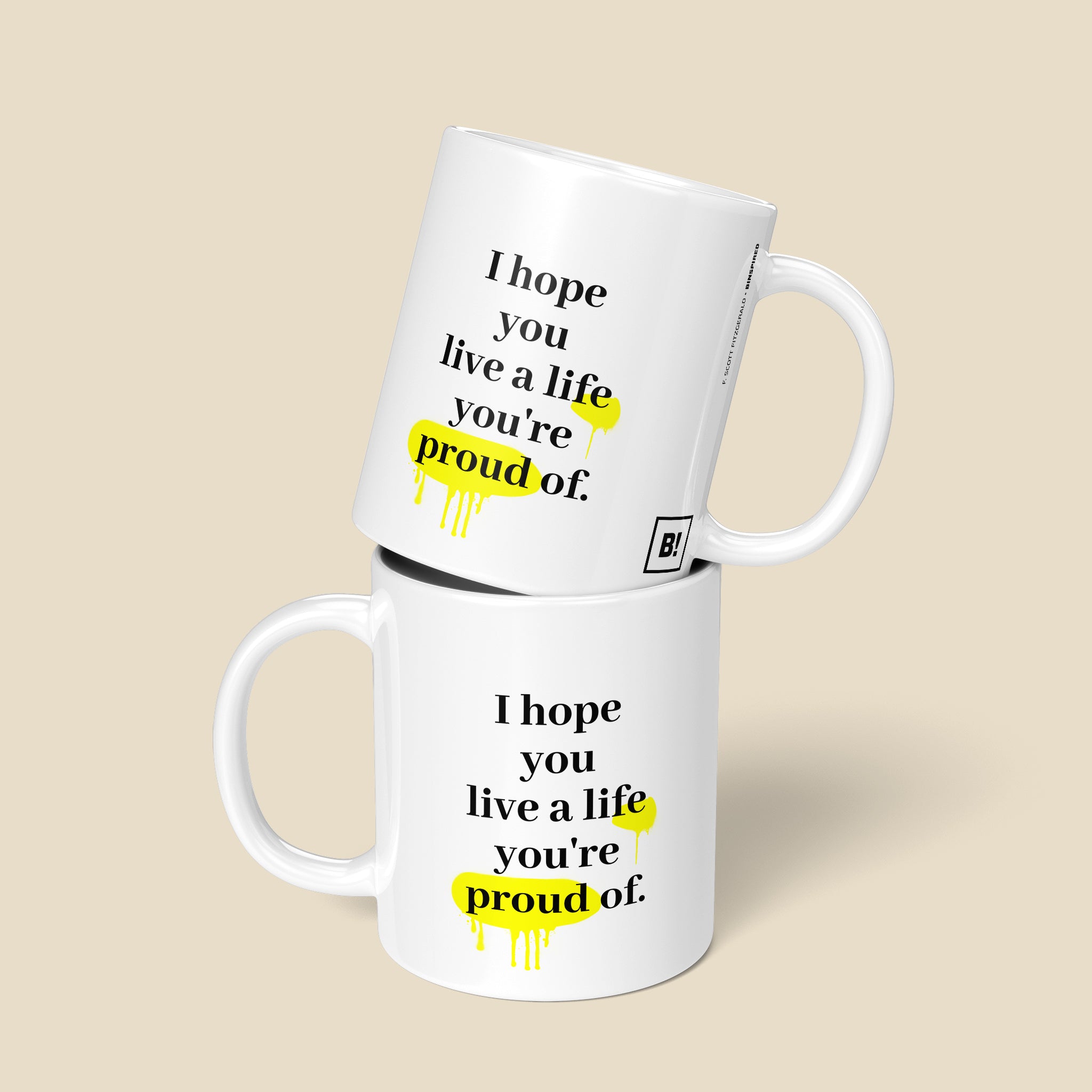 Be inspired by F. Scott Fitzgerald's famous quote, "I hope you live a life you're proud of" on this 11oz white glossy coffee mug with a front and back view.