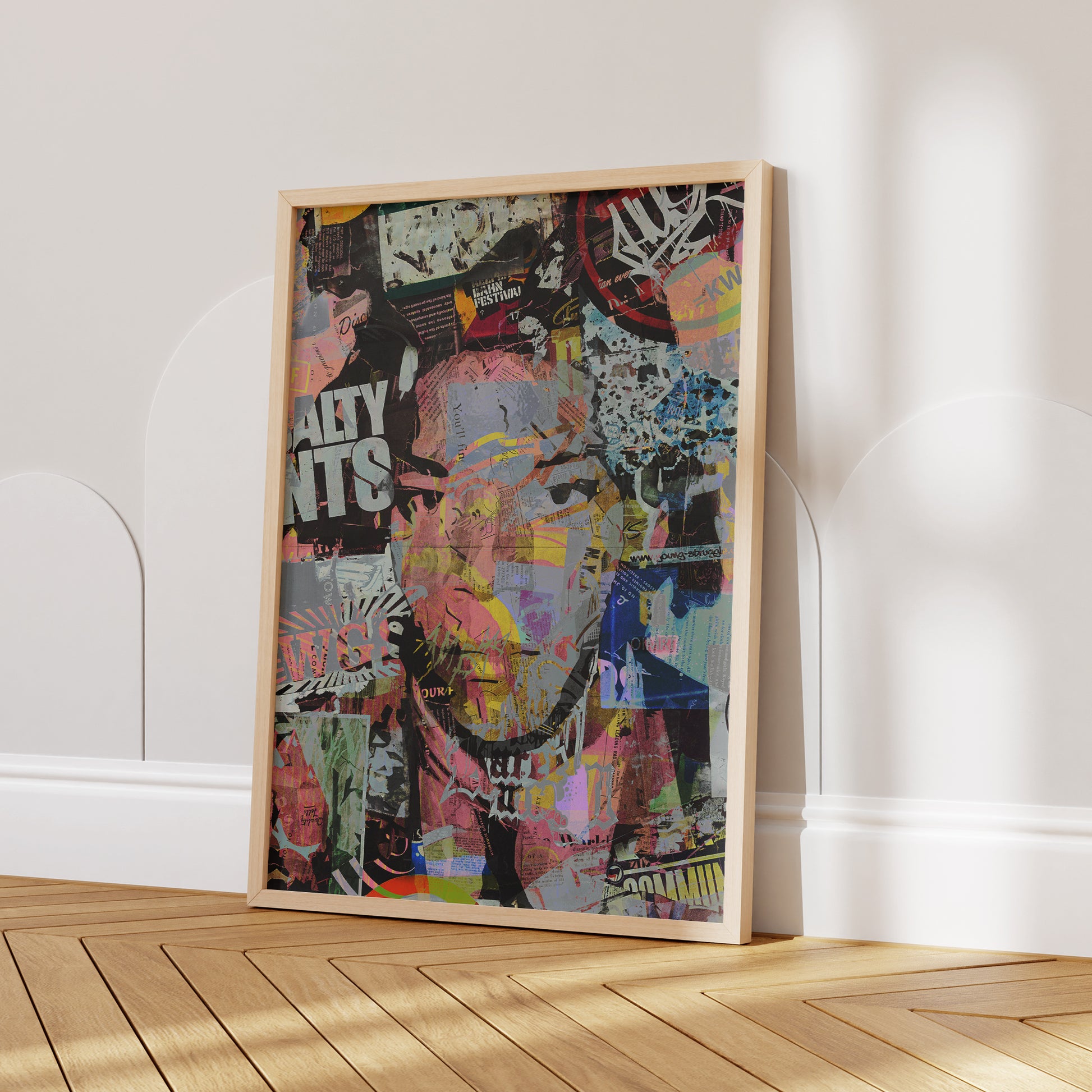 Iconic Jean-Michel Basquiat Street Art Portrait Art Print displayed in a stylish living room, adding a bold and dynamic artistic touch to the space.