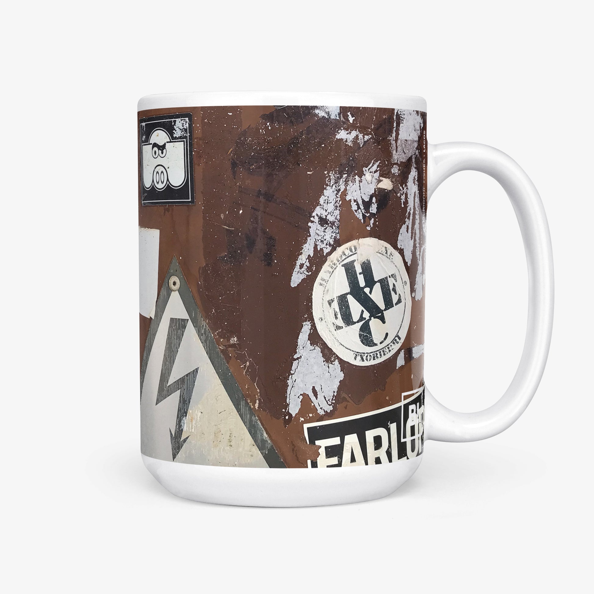 Be inspired by our Urban Art Coffee Mug – Merioone Fishes from Lagos. The mug has a capacity of 15 oz and the handle on the right side. The design of the mug captures the essence of the street and gives the mug an authentic urban feel, making it resemble a piece of street art itself.