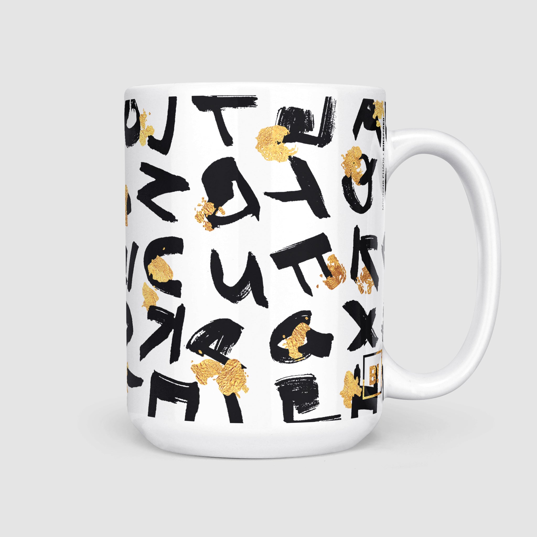 15oz coffee mug, side view with handle on the right, highlighting the artistic design of bold black lettering and golden splatter for a luxurious morning aesthetic.