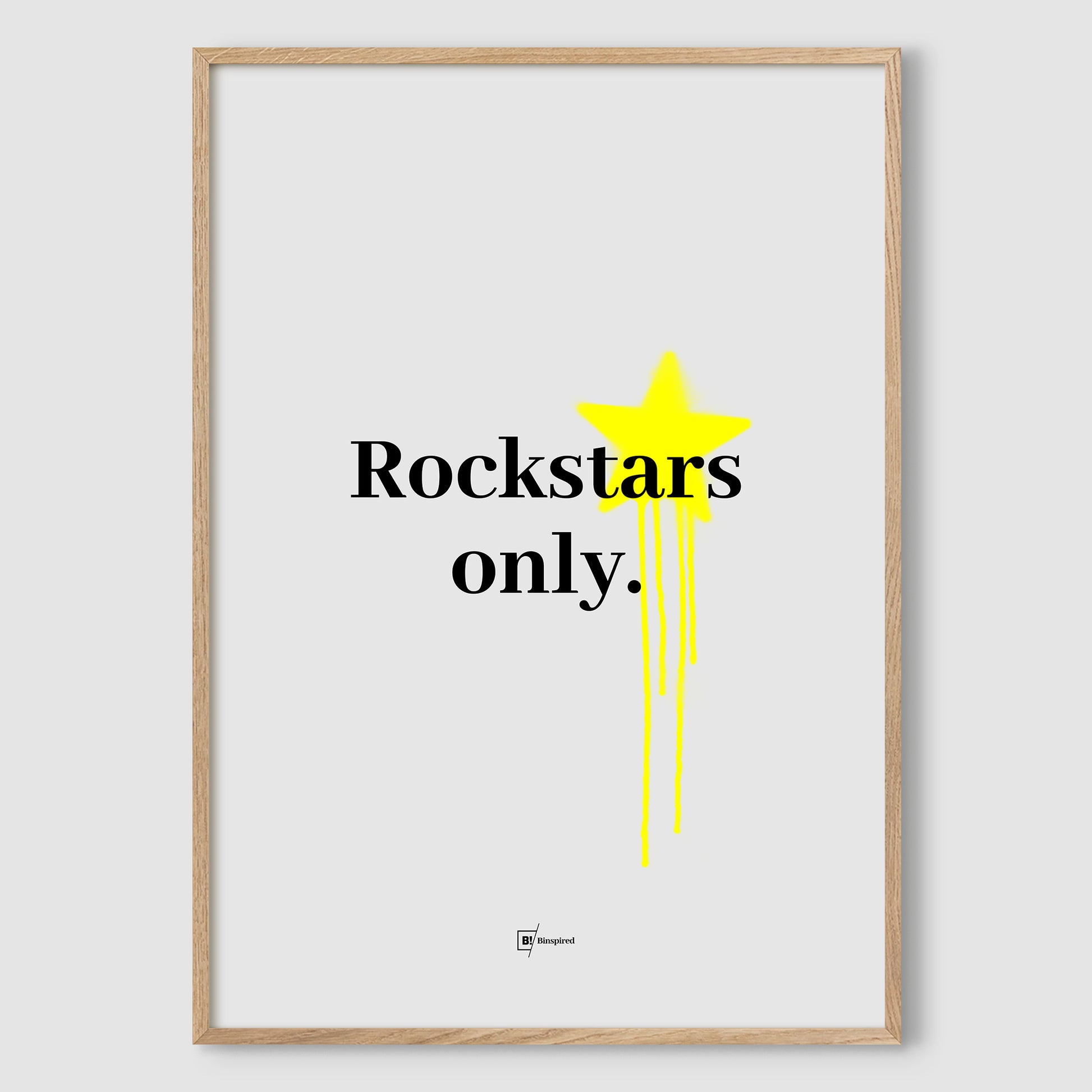 Rockstars Only art print in a natural premium wood frame, showcasing bold black lettering on a gray background with vibrant yellow graffiti splatter for a modern, earthy look.
