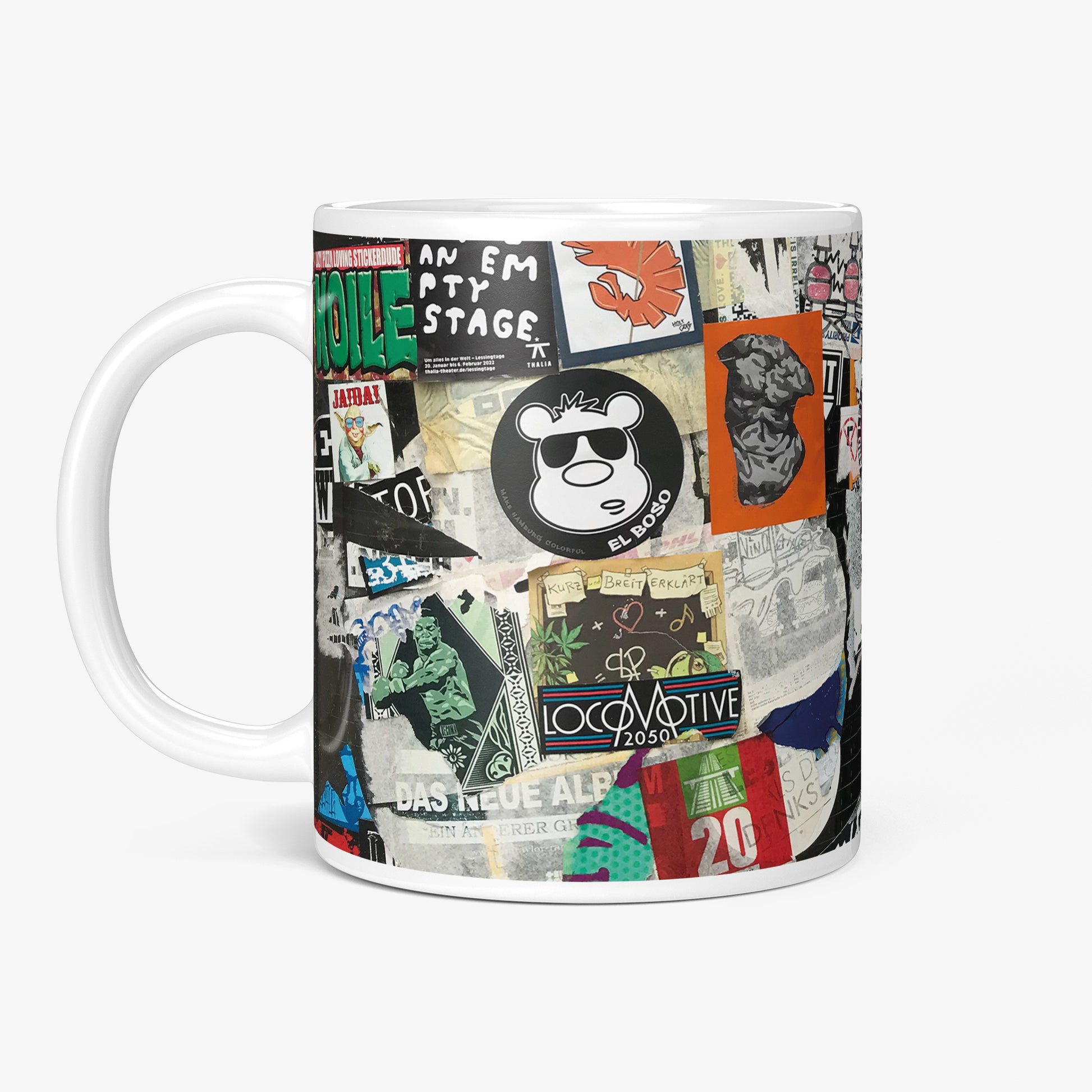 Be inspired by our Urban Art Coffee Mug – To Live And Let Live - No2 from Hamburg. Featuring a 11oz size with the handle on the left. The urban billboard design lends an authentic urban feel to the mug, making it resemble a piece of street art itself.
