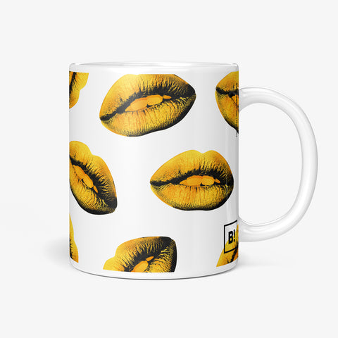 Be inspired by our "Golden Lips" Pop Art Coffee Mug. Featuring a 11oz size with the handle on the right. 