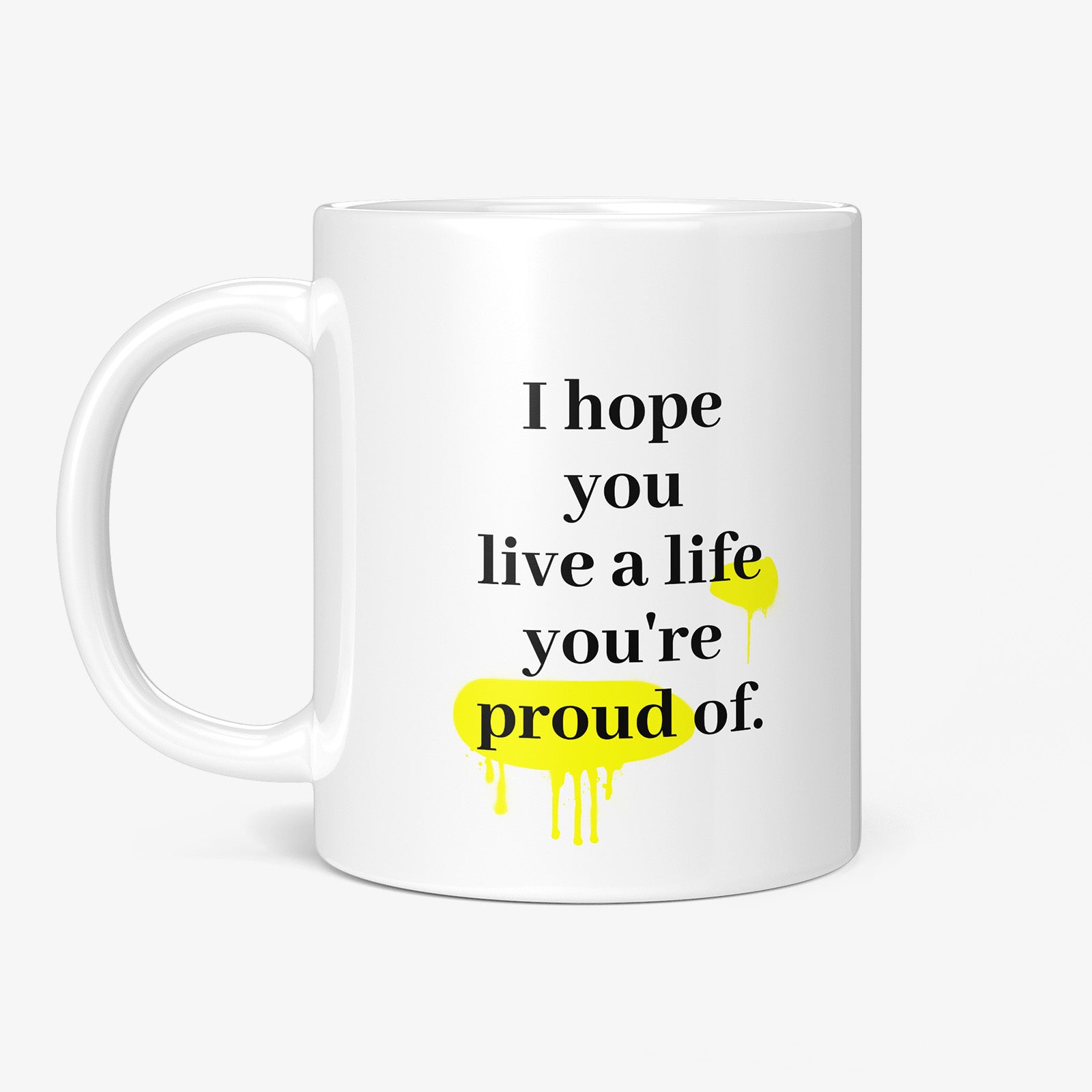 Be inspired by F. Scott Fitzgerald's famous quote, "I hope you live a life you're proud of" on this white and glossy 11oz coffee mug with the handle on the left.