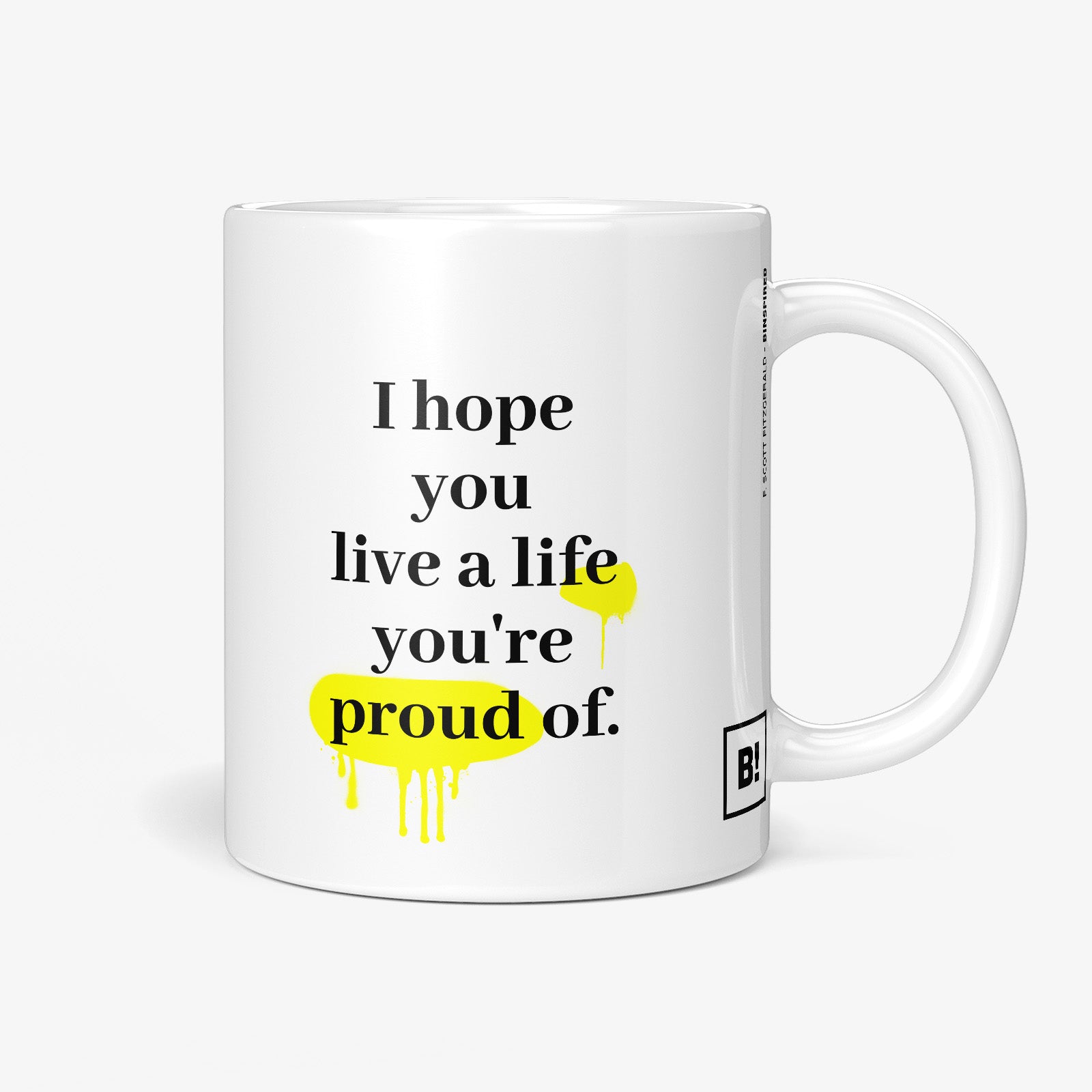 Be inspired by F. Scott Fitzgerald's famous quote, "I hope you live a life you're proud of" on this white and glossy 11oz coffee mug with the handle on the right.