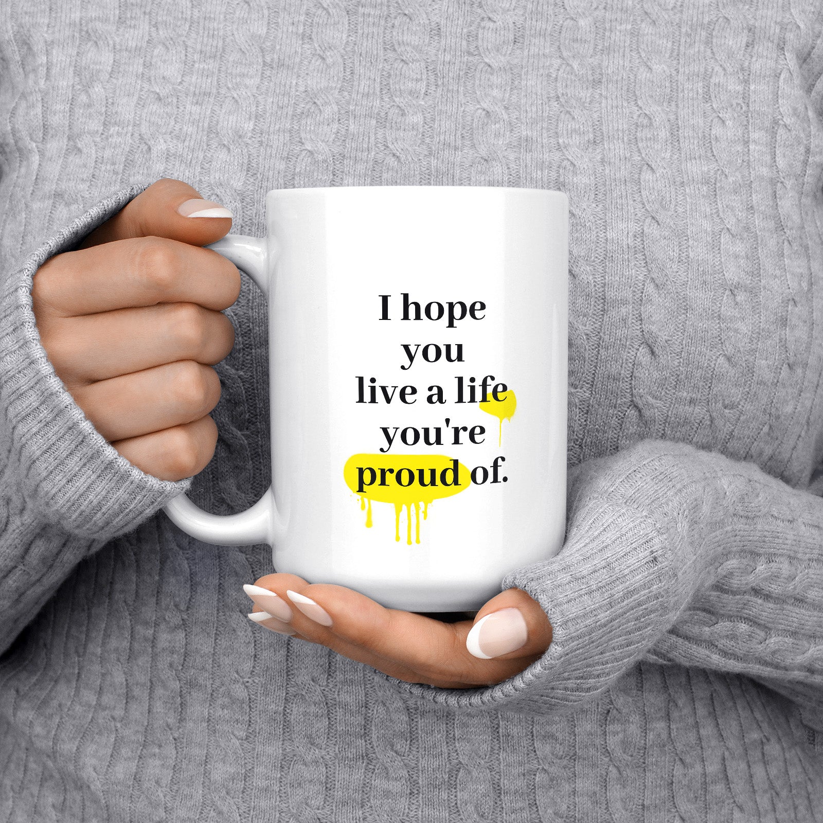 Be inspired by F. Scott Fitzgerald's famous quote, "I hope you live a life you're proud of" on this white and glossy 15oz coffee mug with the handle on the left.