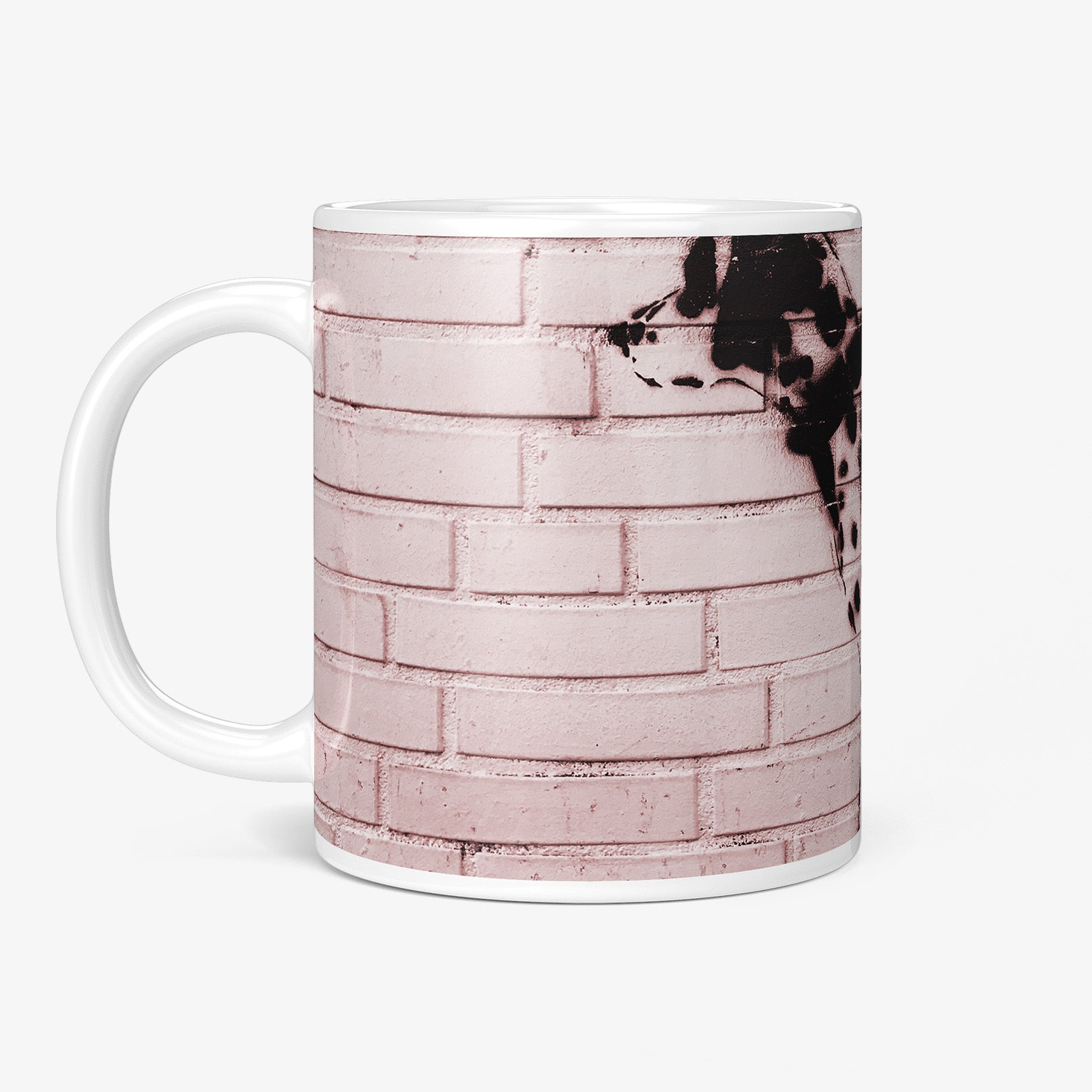 Be inspired by our Urban Art Coffee Mug "Pink Dalmatian" from Hamburg. This mug features an 11oz size with the handle on the left.